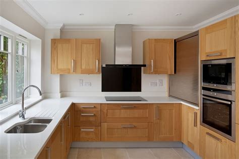 oak cabinets with elemental blue steel|modern oak cabinets.